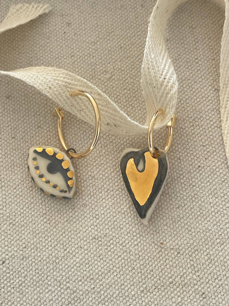 Mismatched Heart + eye earrings