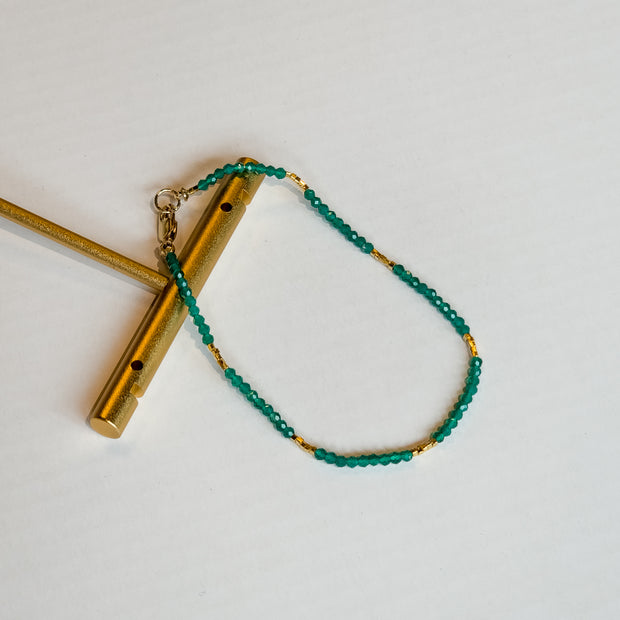 Green onyx gold bead bracelet