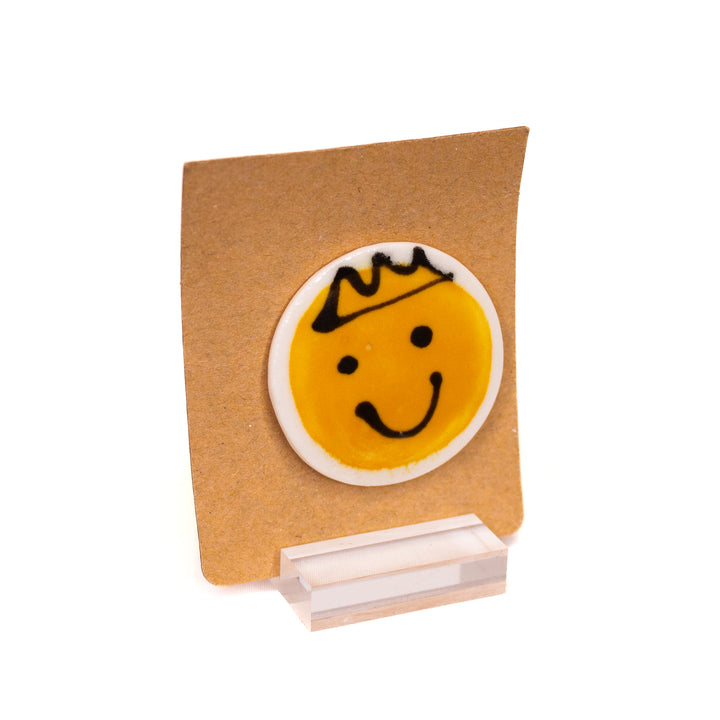 Smiley face ceramic pins