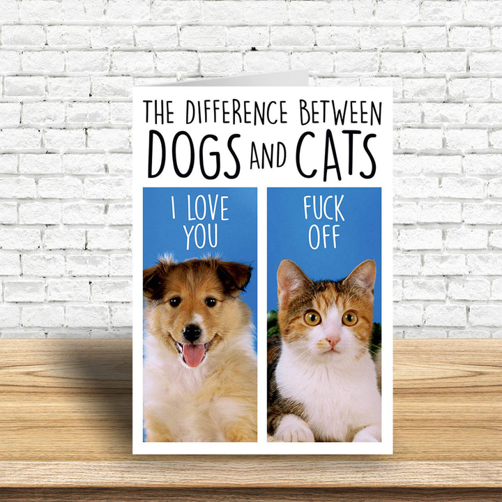 Difference Between Dogs and Cats Greeting Card