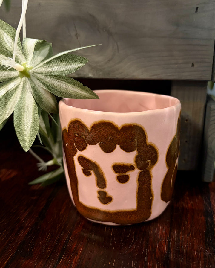 Many Faces Pink Mug