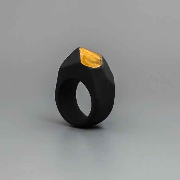 BLACK ROCK WITH GOLD ELEMENT