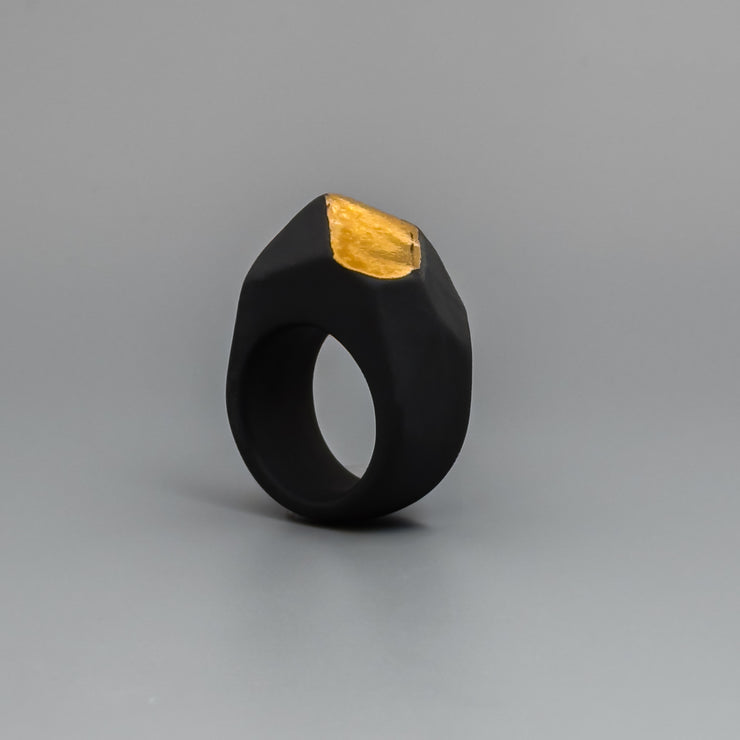 BLACK ROCK WITH GOLD ELEMENT