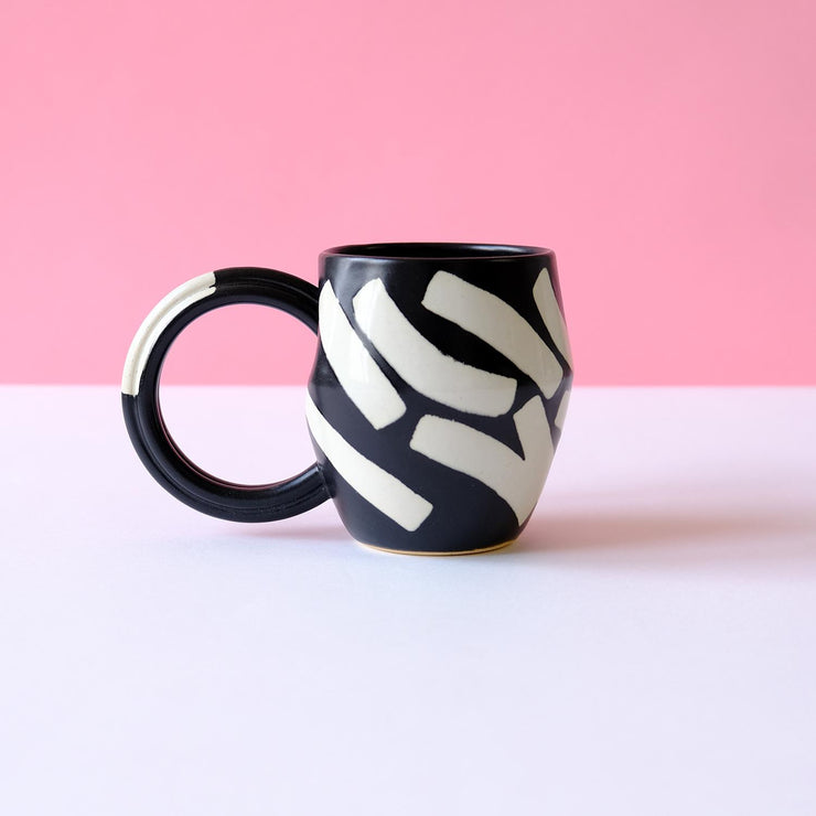 Black Mug with Eggshell Shapes
