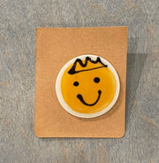 Smiley face ceramic pins