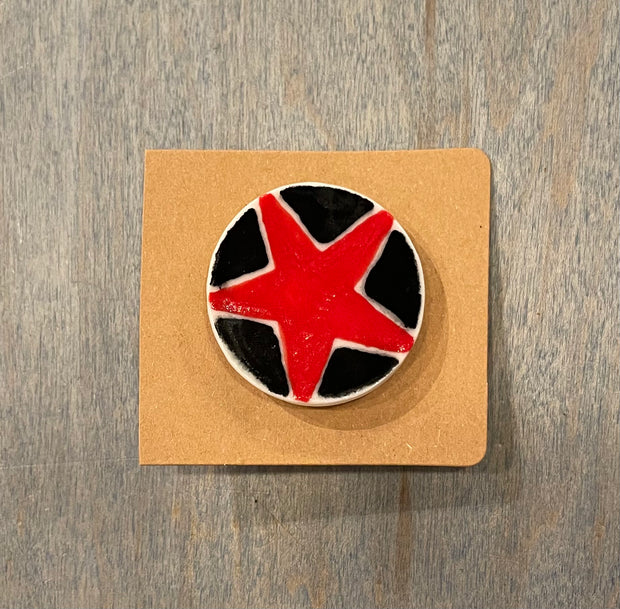 Red & black star ceramic pin