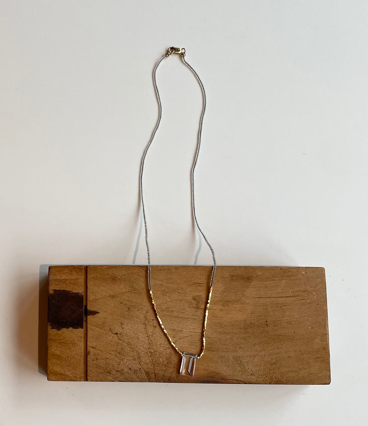 Clear seed and gold vermeil beads with clear quartz rectangular drop necklace
